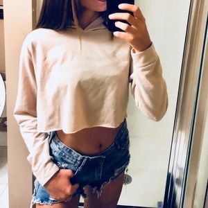 Yellow/cream colored hooded crop top